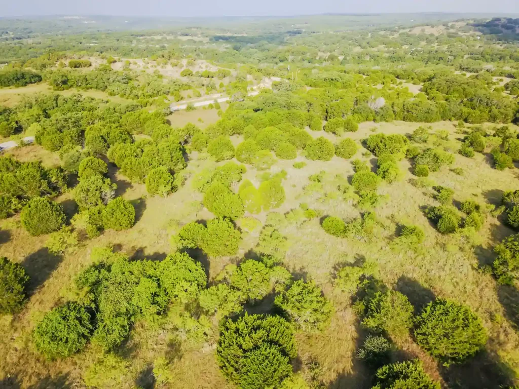 Aerial view of land with trees in the Texas Hill Country